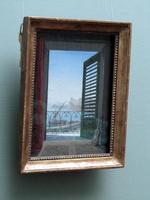 Trompe l'oeil painting of a door opening onto a balcony