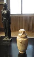 Eyptian statue and canopic jar