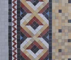 Floor tiling in diamond pattern, brown, red, black, and white