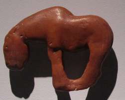Brown stone image of horse; 12000 BCE