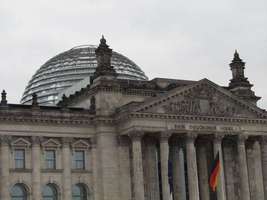 Upper part of Reichstag showing dome and triangular setting over main entrance
