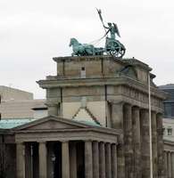 Side view of Brandenburg gate; winged charioteer atop gate