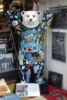 Buddy bear painted with whimsical figures
