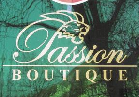 Passion boutique logo; capital P in shape of a lion head