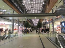 Interior Postdamer Arkaden mall; shopws on either side