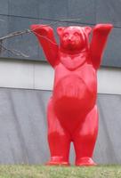 Bear statue painted entirely red; in front of Vodafone headquarters