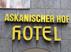 Sign for Askanischer Hof Hotel; word “hotel” has odd font