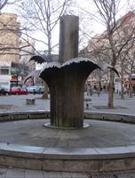 Core of water fountain; metal looks like water splashing outwards