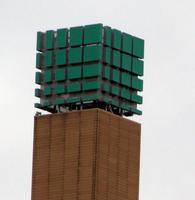 Tower with rectangular green plates arranged in a cube