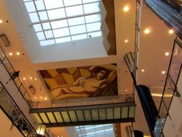Art deco painting of reclining nude on ceiling at Alexa shopping center
