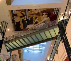 Art deco painting of fashionable people; on ceiling at Alexa shopping center
