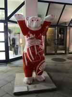 Bear painted red with white highlights of Berlin landmarks