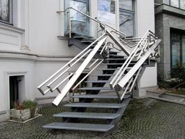 Sculpture that is part of a staircase railing