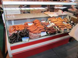 Display case with multiple varieties of sausage