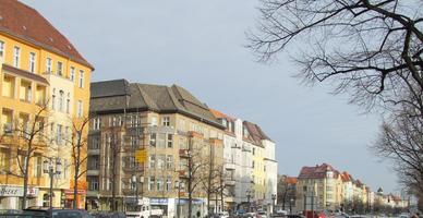 Long row of apartment buildings; old style architecture