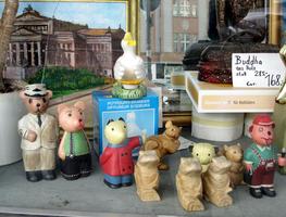 Wooden toy animal figures in store window