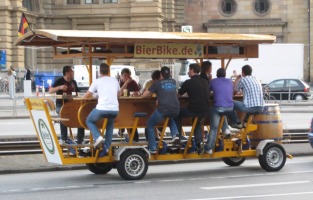 multi-person bike serving beer