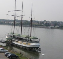 ship in river near bridge