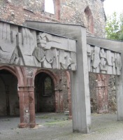 modern sculpture amid ruins