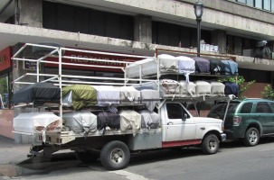 truck carrying caskets