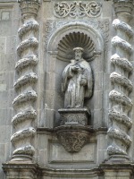 detail showing statue on church exterior wall