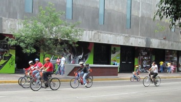 bicyclists going down street