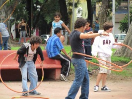 children playing with hula hoops