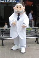 man in a cartoonish pharmacist costume