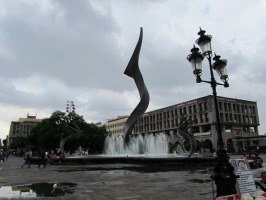 sculpture resembling a twisted nail; located at center of a fountain