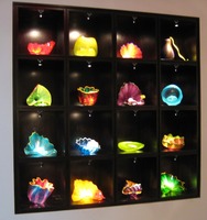 display case showing a large variety of small bowls/vases