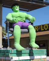 plush figure of the Hulk in a lawn chair