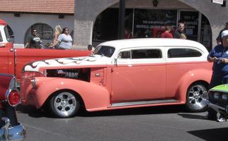 Classic car; salmon lower body and white upper body