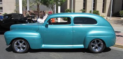 Blue classic car (a Cord)