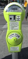 parking meter labeled for collecting money to help the homeless