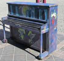 Piano painted with night cityscape