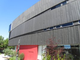 Museum building; red base, black upper floors