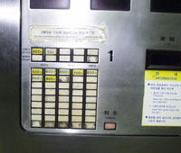 Subway ticket machine closeup 