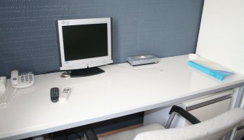 Desk with flat panel TV/monitor