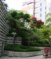 A peaceful garden area in the midst of the city.