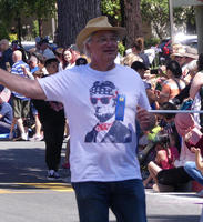 Man wearing T-shirt depicting Abraham Lincoln in sunglasses and flag bandana