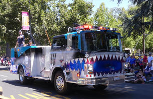 Firetruck with open shark’s mouth painted on the front