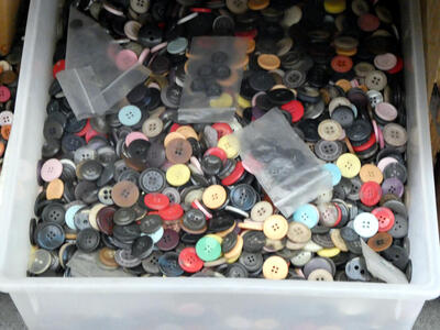 container of buttons
