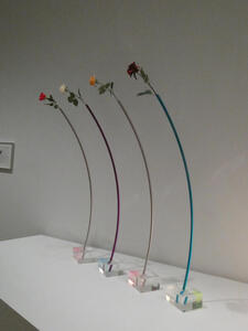 thin curved floor lamps with flower instead of bulb