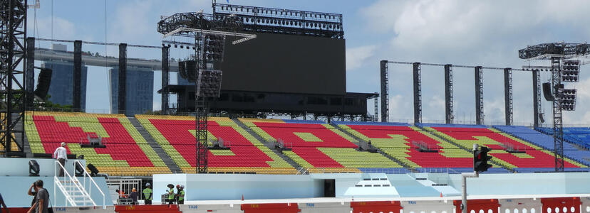 Bleachers with some seats in red spelling out NDP23
