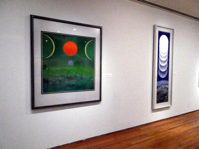 two paintings of moons