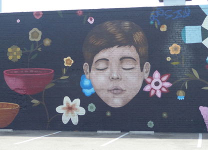 Lrage wall painting of child with eyes closed