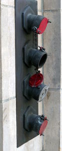 Standpipe with red-colored outlets