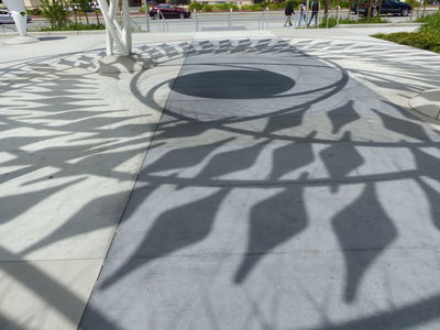 Shadow of sculpture outside convention center