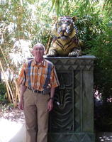 Me in front of a statue of a tiger