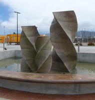 Fountain with three spiral concrete posts